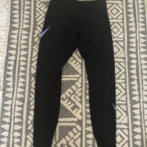 Nike new leggings with purple check on sides